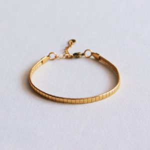 Armband plat gestreept goud
